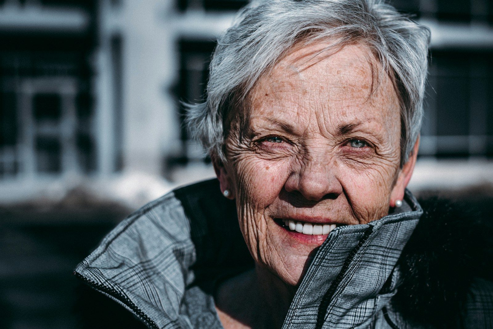 Stock photo of a smiling older adult. Model is not a client.
